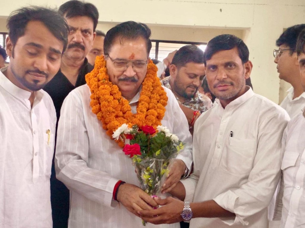 Dr. Krishan Bir Chaudhary welcomed with marigold garland